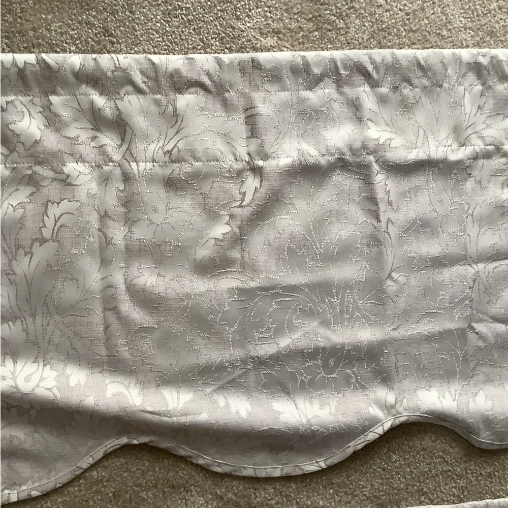Valance set of (2) beige with pretty designs only used 6 months like new…